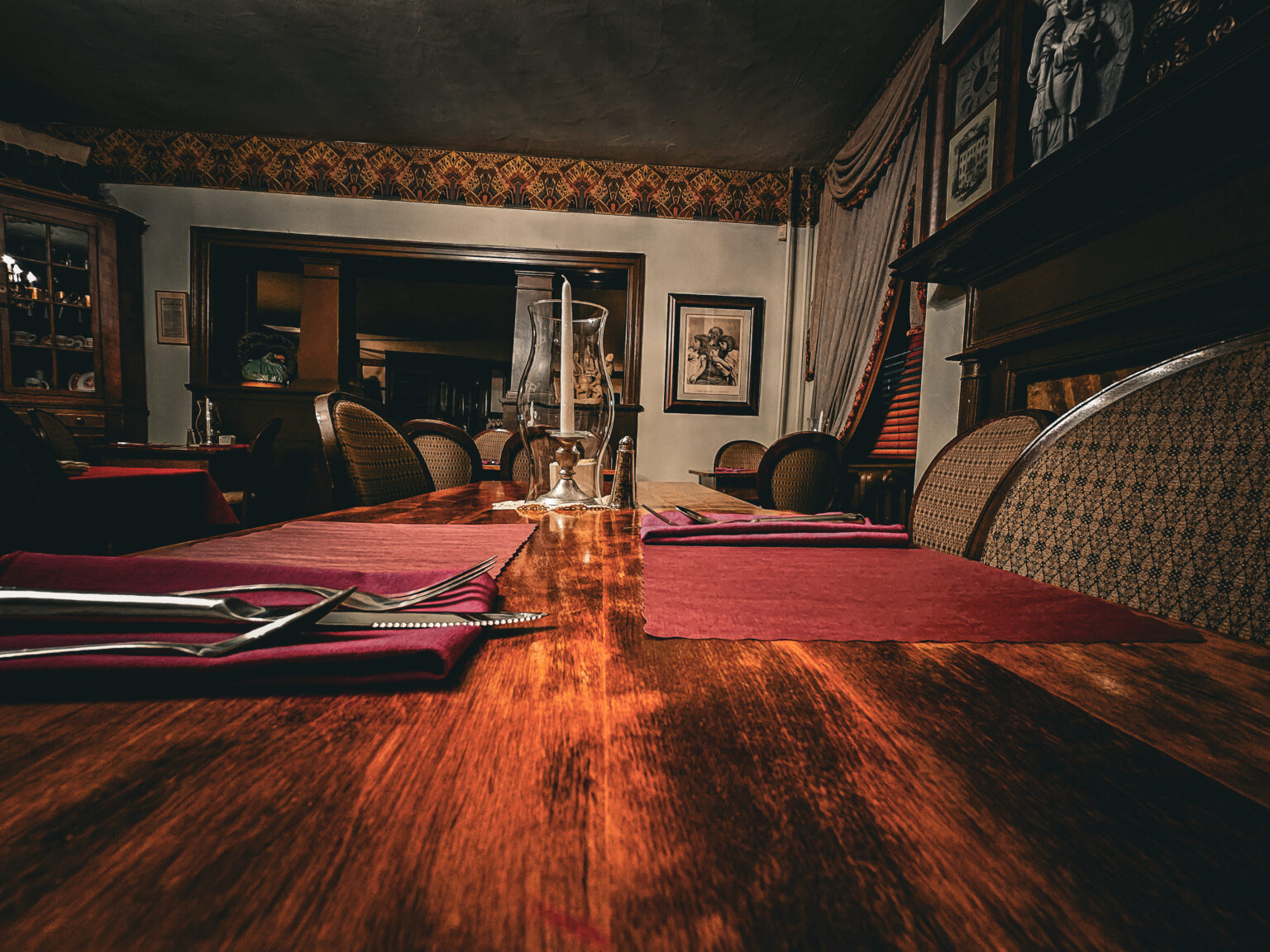 Candlelit table inside the Farnsworth House at night