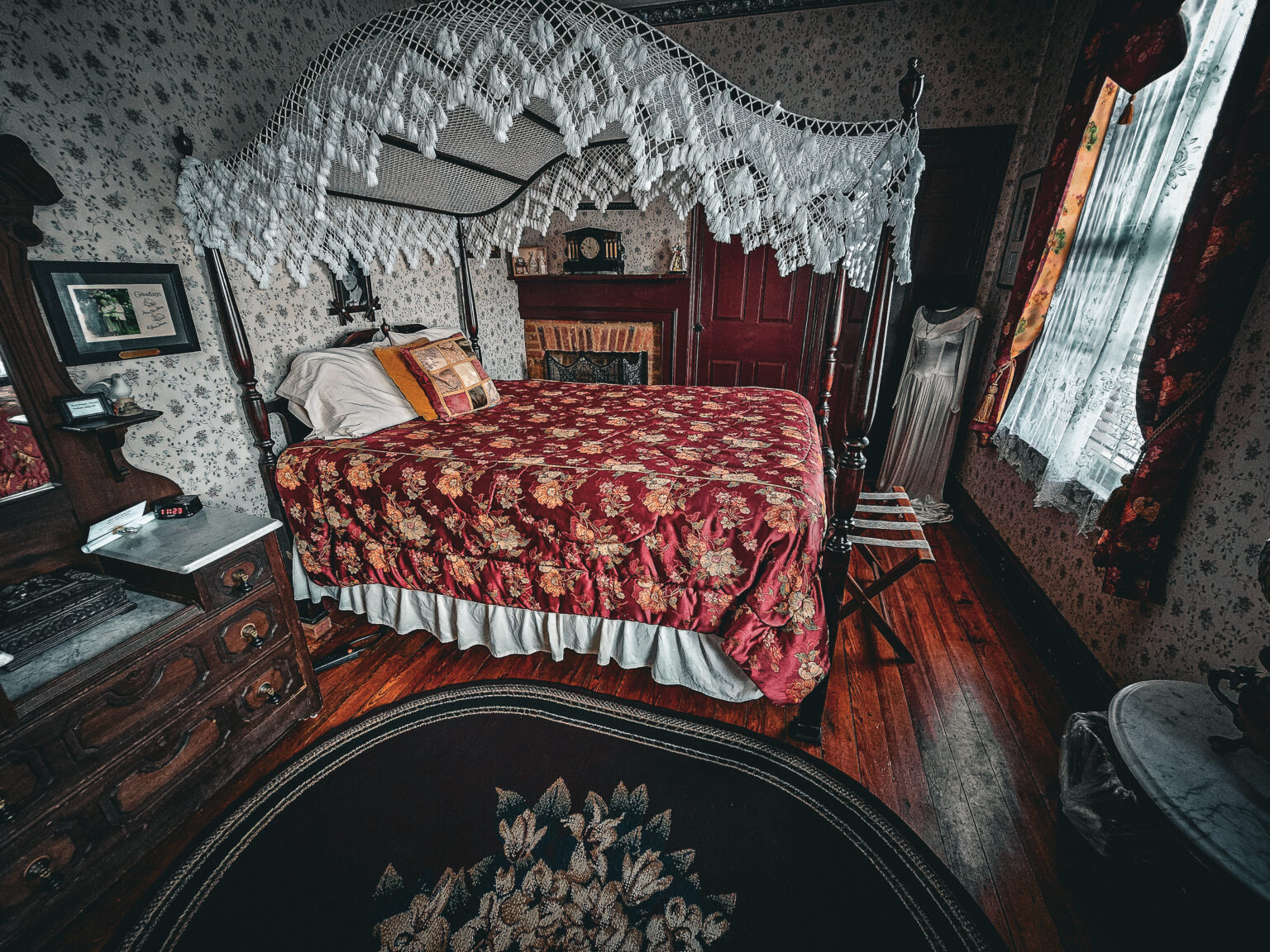 Canopy bed in a historic guest room