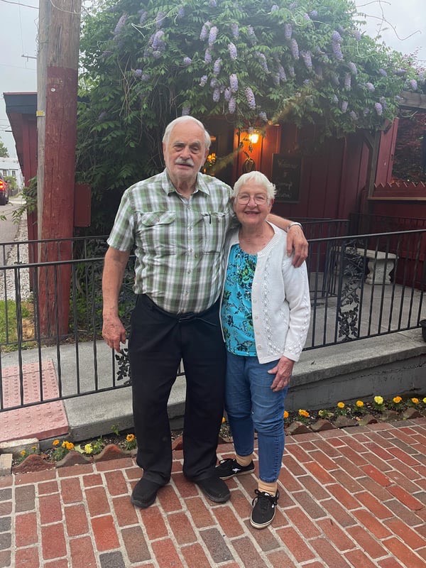 Loring and Jean Shultz behind Sweney's Tavern in 2022